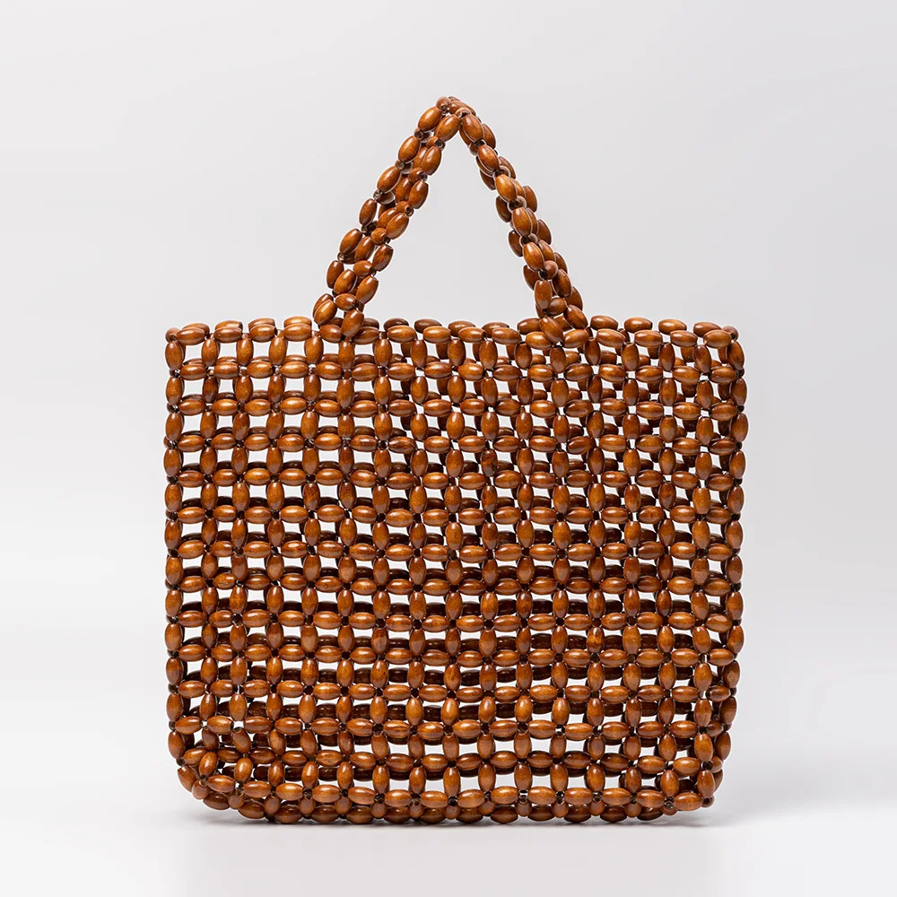 Сплошная цветная деревянная сумка из бисера, тканая сумка ручной работы, женская большая сумка из деревянных бусин с полым дизайном
Сплошная цветная деревянная сумка из бисера, тканая сумка ручной работы, женская большая сумка из деревянных бусин с полым дизайном