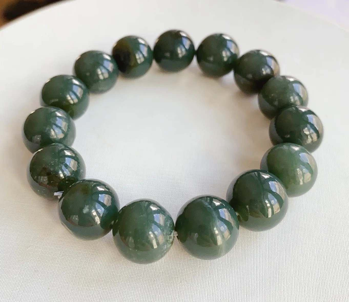 AAA Real Hetian jade bracelet Bead Size13-14mm. Dark green
AAA Real Hetian jade bracelet Bead Size13-14mm. Dark green