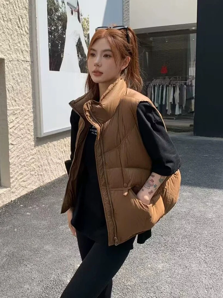 Autumn Winter Short Stand Collar Fluffy Down Vest Female Zipper Quilted Waistcoat Women White Duck Down Sleeveless Cotton Vests
Autumn Winter Short Stand Collar Fluffy Down Vest Female Zipper Quilted Waistcoat Women White Duck Down Sleeveless Cotton Vests