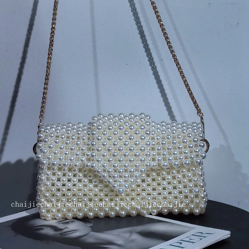 2024 New Retro Niche Design Handmade Pearl Flip Cover Beaded Crossbody Bag Fashion Chain Women's Shoulder Bags Can Be Customized
2024 New Retro Niche Design Handmade Pearl Flip Cover Beaded Crossbody Bag Fashion Chain Women's Shoulder Bags Can Be Customized