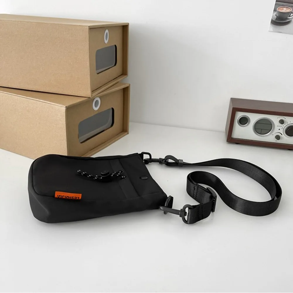 Casual Crossbody Phone Pouch Multifunctional Korean Style Nylon Shoulder Bag Solid Color Handheld Men Square Bag Business
Casual Crossbody Phone Pouch Multifunctional Korean Style Nylon Shoulder Bag Solid Color Handheld Men Square Bag Business
