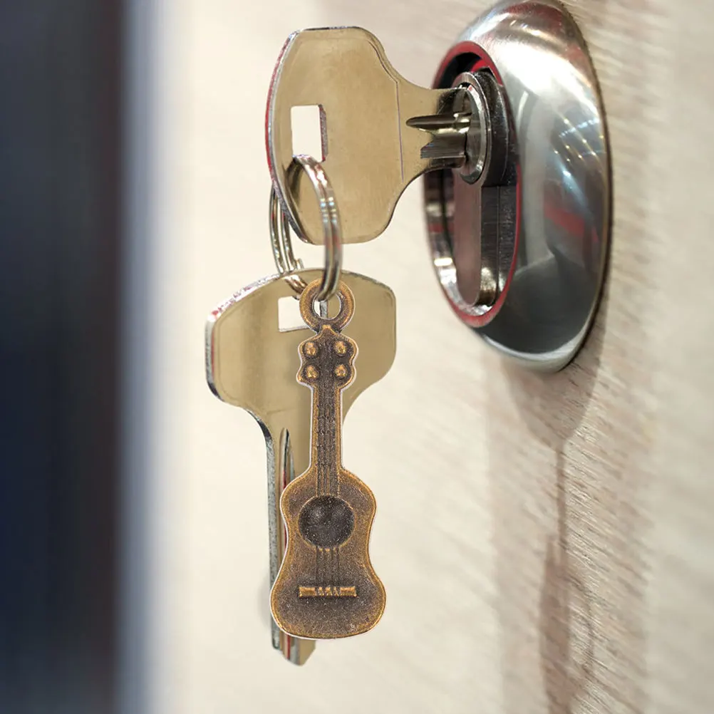 100 шт., подвески в виде гитары, мини-сделай сам, металлический чехол для телефона, подвески, украшения в виде корпуса телефона, ремесленные украшения, подвеска в виде гитары 
100 шт., подвески в виде гитары, мини-сделай сам, металлический чехол для телефона, подвески, украшения в виде корпуса телефона, ремесленные украшения, подвеска в виде гитары