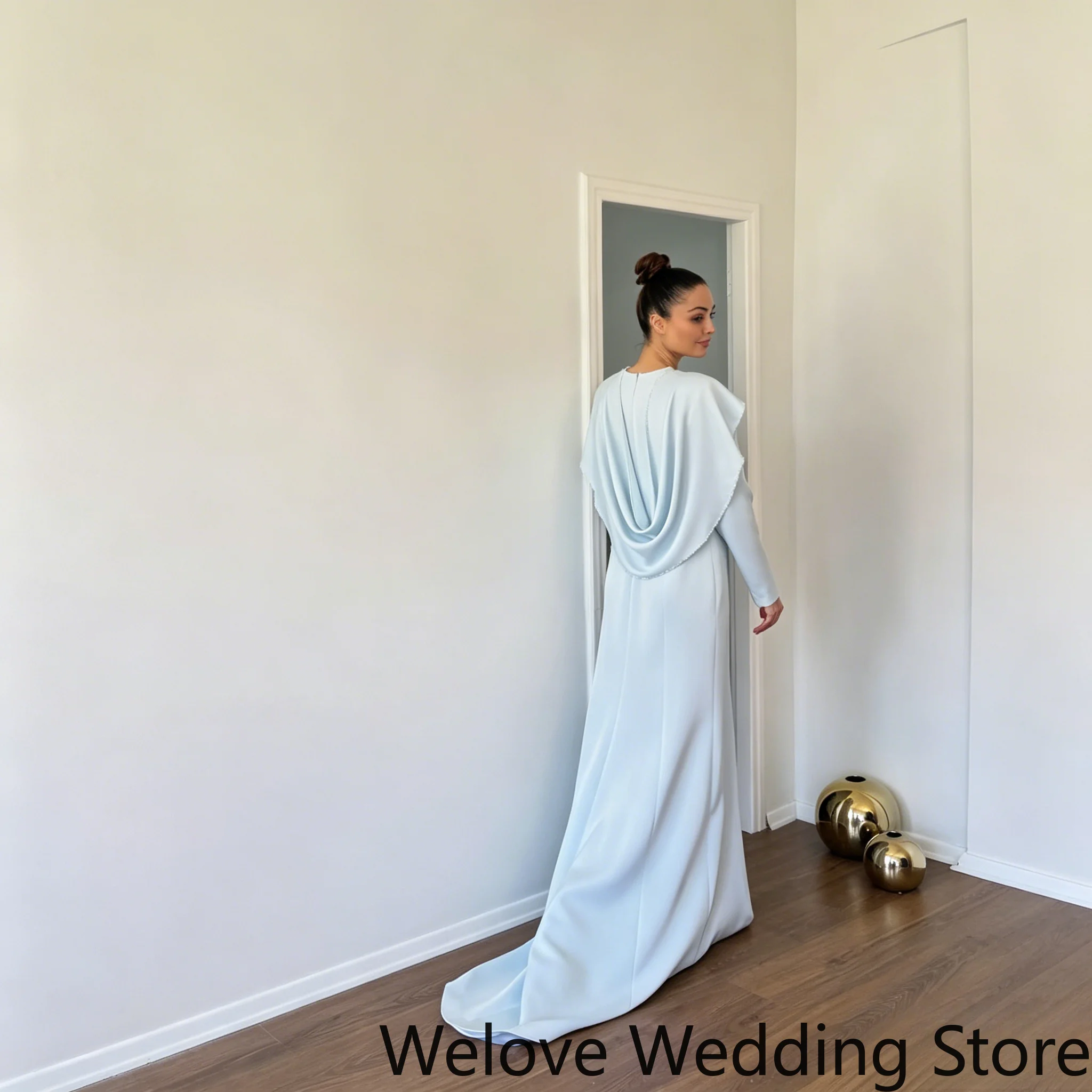 Elegant Light Blue Formal Evening Gown Featuring Round Neckline, Long Sleeves, Shoulder Cape Detail, Draped Cowl Back
Elegant Light Blue Formal Evening Gown Featuring Round Neckline, Long Sleeves, Shoulder Cape Detail, Draped Cowl Back