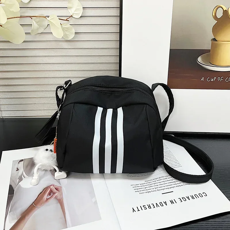 Women's casual versatile striped contrasting color shoulder messenger bag shell bag
Women's casual versatile striped contrasting color shoulder messenger bag shell bag