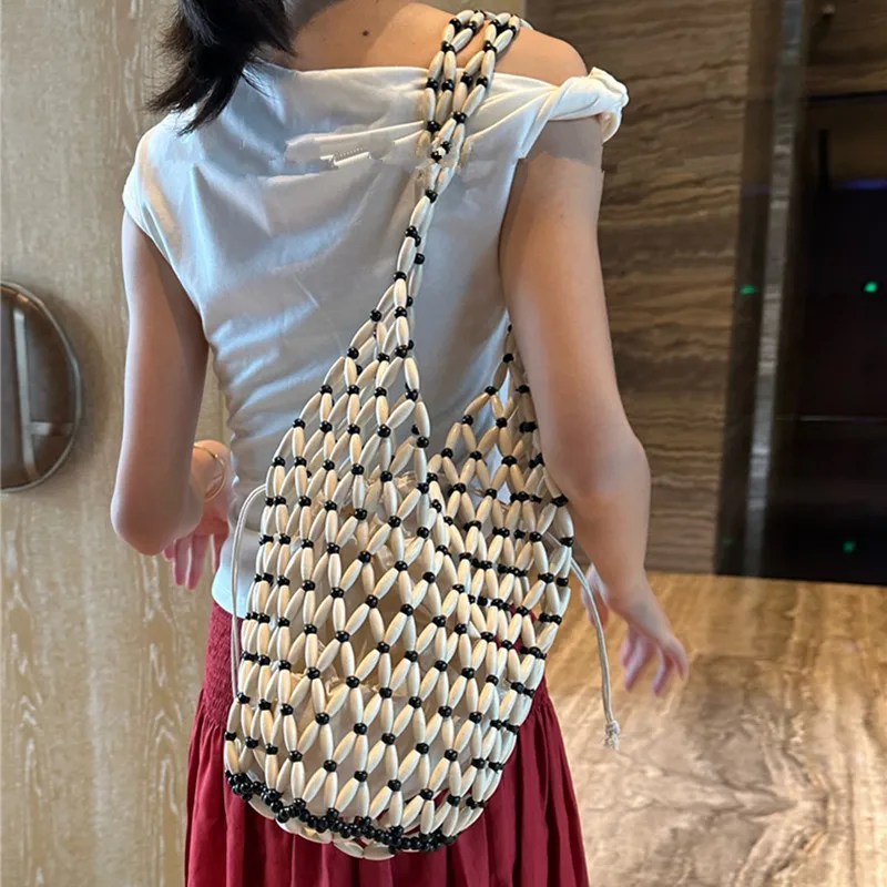 Designer Women's Bag Handbag Luxury Bag Bucket Bag Handwoven Hollow Out Wooden Bead Shoulder Bag Vacation Beach Bag Tote Bag 
Designer Women's Bag Handbag Luxury Bag Bucket Bag Handwoven Hollow Out Wooden Bead Shoulder Bag Vacation Beach Bag Tote Bag