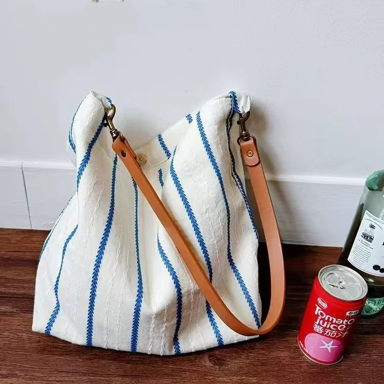 Women's Vintage Blue Striped Canvas Hobo Bag Leather Strap Large Capacity Crossbody Tote Bag for Daily Use & Travel
Women's Vintage Blue Striped Canvas Hobo Bag Leather Strap Large Capacity Crossbody Tote Bag for Daily Use & Travel