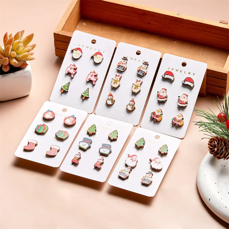 New Christmas wooden stud earrings simple personality Elk Santa Santa stockings earrings 
New Christmas wooden stud earrings simple personality Elk Santa Santa stockings earrings