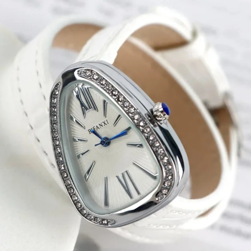 Уникальные кварцевые часы со змеей AAA, женские модные простые женские часы с кожаным ремешком, водонепроницаемые наручные часы
Уникальные кварцевые часы со змеей AAA, женские модные простые женские часы с кожаным ремешком, водонепроницаемые наручные часы