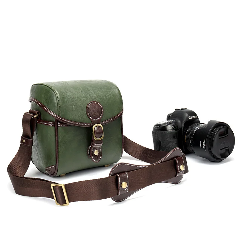 Suitable for Canon Nikon SLR camera bag, liner bag, trendy Korean version of imitation leather shoulder micro-single camera bag
Suitable for Canon Nikon SLR camera bag, liner bag, trendy Korean version of imitation leather shoulder micro-single camera bag