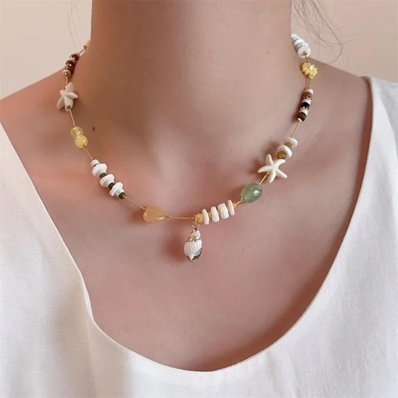 Minar Boho Mix Color Irregular Natural Stone Shell Star Flower Heart Trumpet Shell Pendant Necklaces for Women Strand Chokers
Minar Boho Mix Color Irregular Natural Stone Shell Star Flower Heart Trumpet Shell Pendant Necklaces for Women Strand Chokers