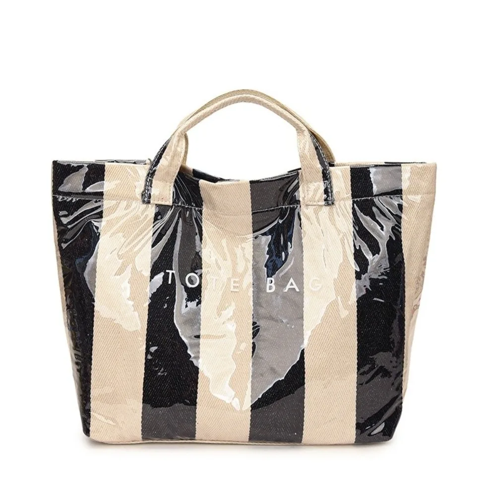 Waterproof Striped Tote Bag Large-Capacity Fixed Shoulder Straps PVC Handbag Color-Blocked Design Inner Zipper Pocket
Waterproof Striped Tote Bag Large-Capacity Fixed Shoulder Straps PVC Handbag Color-Blocked Design Inner Zipper Pocket