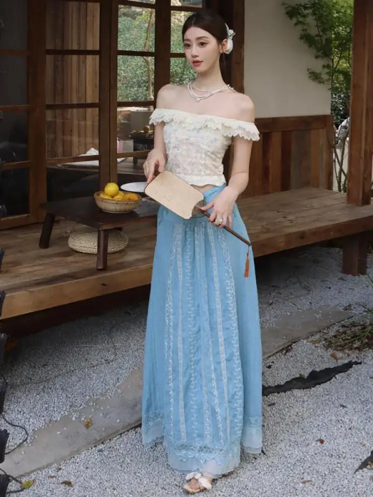 Summer French Retro Two Piece Set Women Beige Print Off Shoulder Backless Ruffles Tops And Blue Embroidery High Waist Long Skirt
Summer French Retro Two Piece Set Women Beige Print Off Shoulder Backless Ruffles Tops And Blue Embroidery High Waist Long Skirt