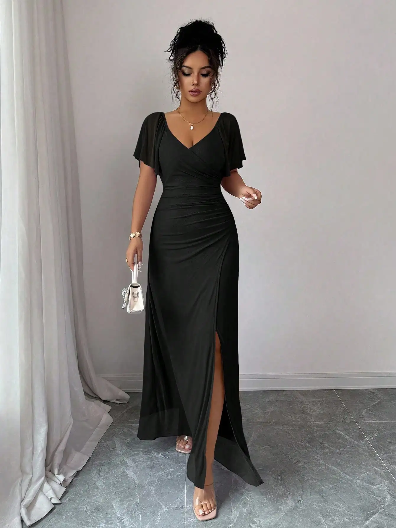Women's Black V-Neck Ruffle Sleeve Pleated Waist High Slit Floor-Length Evening Dress
Women's Black V-Neck Ruffle Sleeve Pleated Waist High Slit Floor-Length Evening Dress
