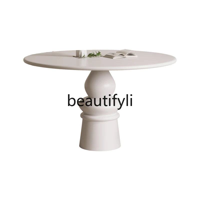 French retro solid wood round dining table and chair combination creative home cream style solid wood round table 
French retro solid wood round dining table and chair combination creative home cream style solid wood round table