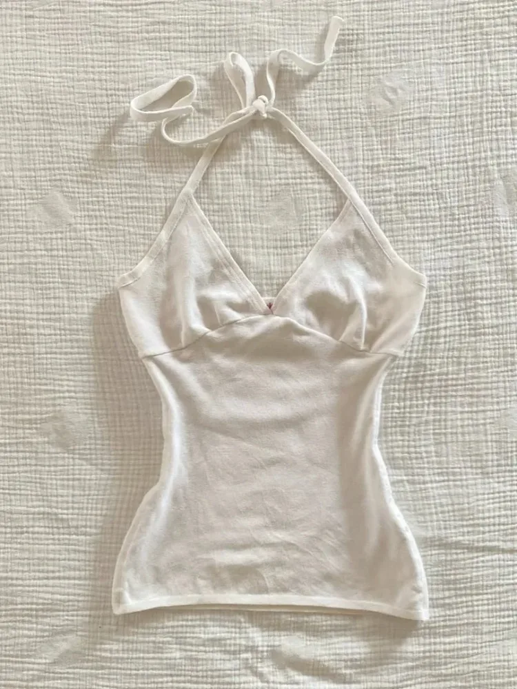 Летние кавайные белые майки для девочек, женские однотонные укороченные топы в стиле панк Y2k, женские эстетические готические корсетные футболки на бретельках, новинка
Летние кавайные белые майки для девочек, женские однотонные укороченные топы в стиле панк Y2k, женские эстетические готические корсетные футболки на бретельках, новинка