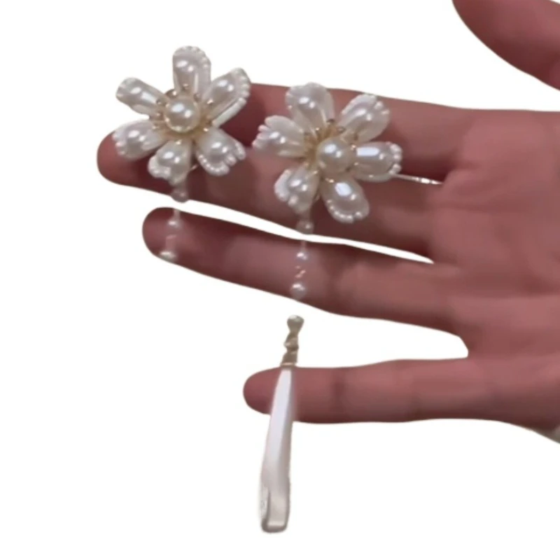 Pearl flower water drop fringed earrings, women's light luxury high-end long earrings
Pearl flower water drop fringed earrings, women's light luxury high-end long earrings
