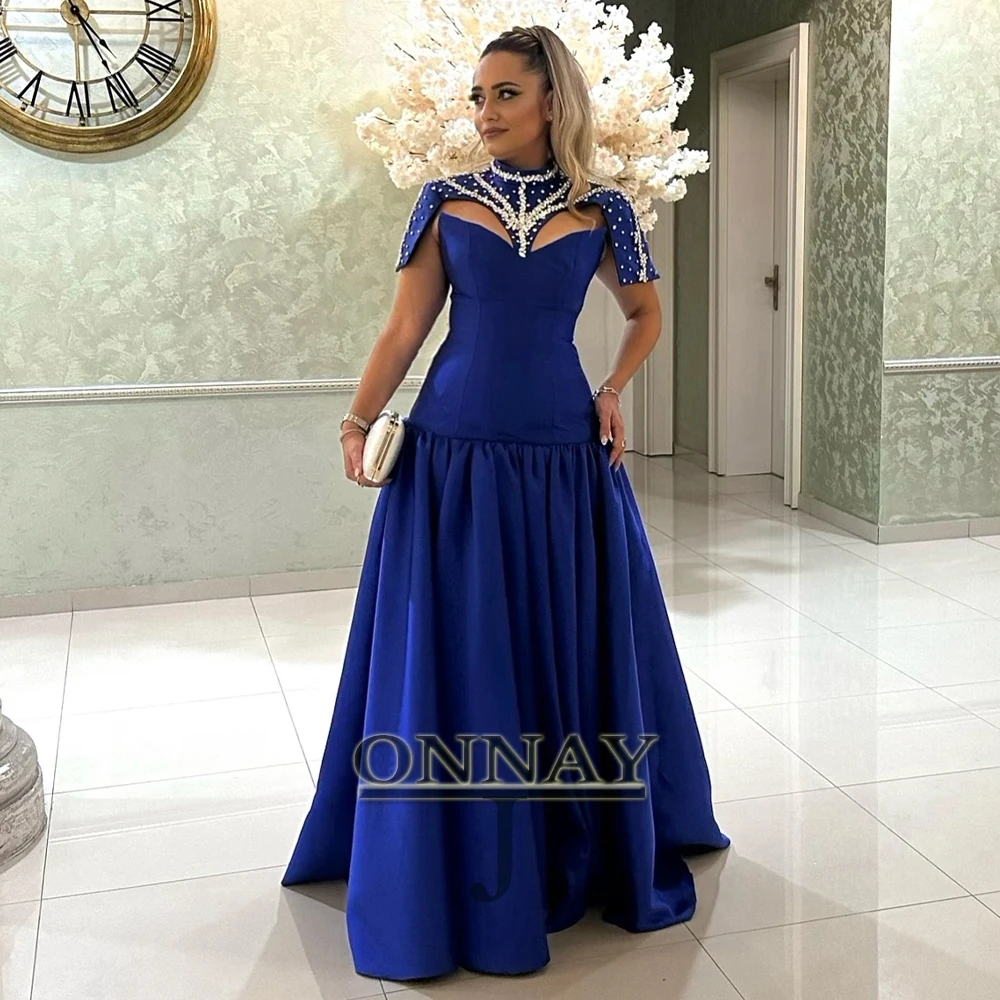 Необычные вечерние платья с высоким воротом по индивидуальному заказу, плиссированные с короткими рукавами и жемчугом для женщин, Дубай, Саудовская Аравия, Vestidos De Fiesta Plus
Необычные вечерние платья с высоким воротом по индивидуальному заказу, плиссированные с короткими рукавами и жемчугом для женщин, Дубай, Саудовская Аравия, Vestidos De Fiesta Plus