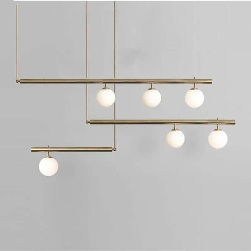 Nordic modern three-head restaurant chandelier designer personality creative minimalist long dining table cafe bar chandelier
Nordic modern three-head restaurant chandelier designer personality creative minimalist long dining table cafe bar chandelier