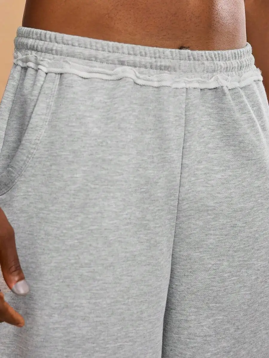 Grey Loose-Fit Mid-Length Athletic Shorts For Men, Casual Wear With Raw Hem Detail
Grey Loose-Fit Mid-Length Athletic Shorts For Men, Casual Wear With Raw Hem Detail