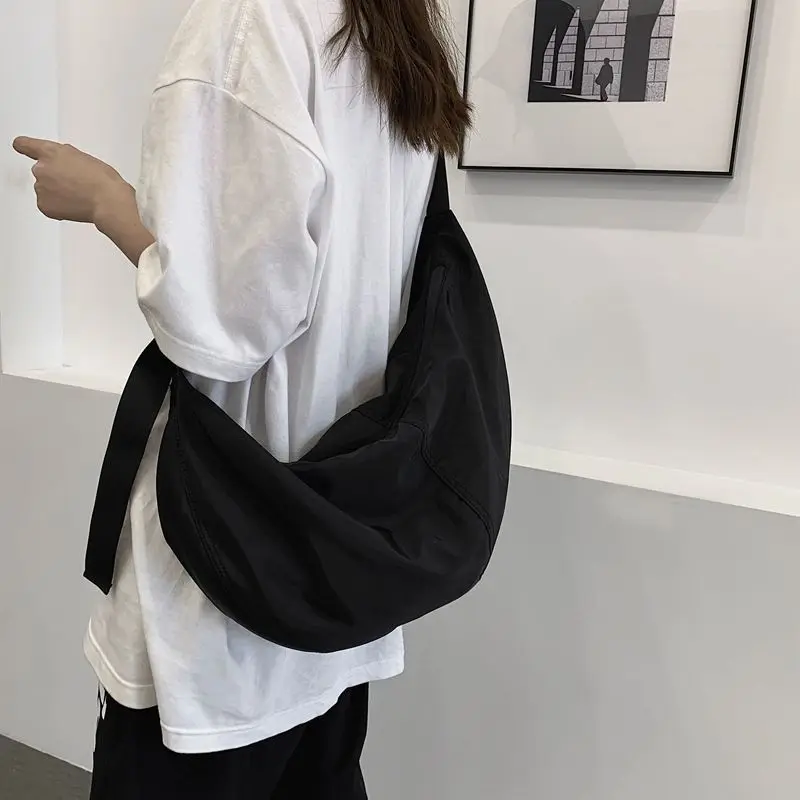 Oxford cloth dumpling bag for women, trendy and cool couple, lazy style crossbody bag large capacity student class shoulder bag
Oxford cloth dumpling bag for women, trendy and cool couple, lazy style crossbody bag large capacity student class shoulder bag