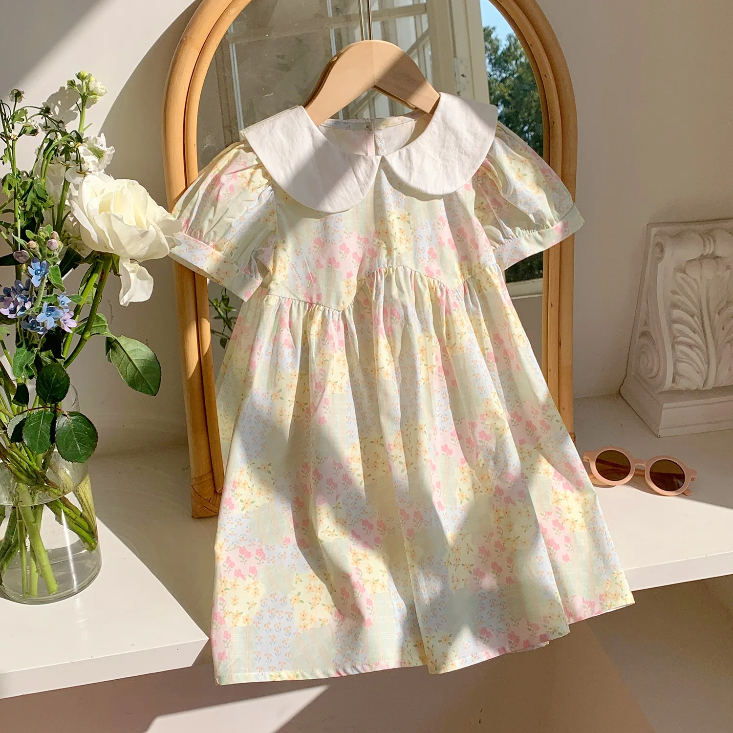 Korean Floral Peter Pan Neck Short Sleeved Girls Dress 2025 Summer New Irregular Design Children Dress
Korean Floral Peter Pan Neck Short Sleeved Girls Dress 2025 Summer New Irregular Design Children Dress