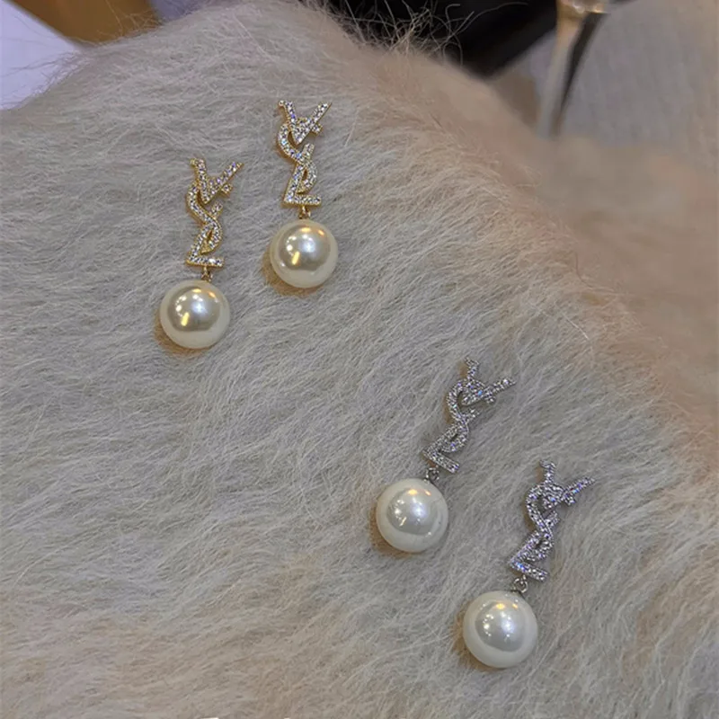 Exaggerated Personality Imitation Pearl Stainless Steel Pendant Earrings for Women Fashion Zircon Earrings Jewelry Accessories
Exaggerated Personality Imitation Pearl Stainless Steel Pendant Earrings for Women Fashion Zircon Earrings Jewelry Accessories