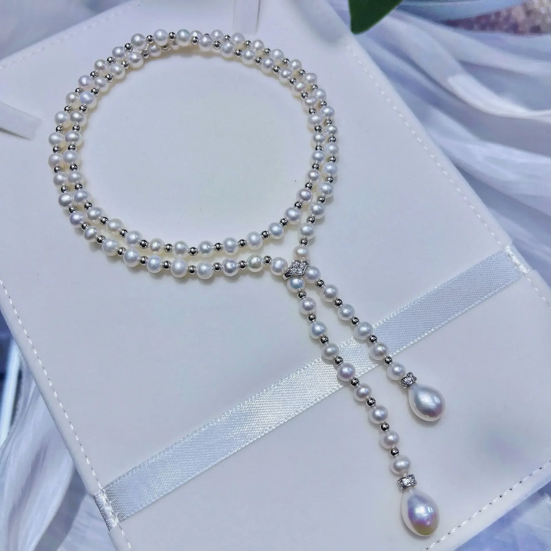Classic Double Adjustable Necklace AAA5-6mm Natural Pearl Necklace, Wear Long Necklace 65cm
Classic Double Adjustable Necklace AAA5-6mm Natural Pearl Necklace, Wear Long Necklace 65cm