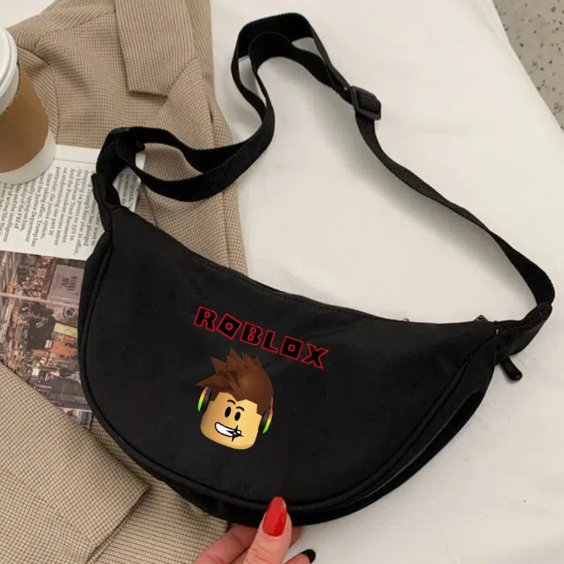 Сумка через плечо из нейлона с милым мультяшным принтом ROBLOXs, женская сумка, сумки-пельмени, легкие и простые сумки для поездок на работу
Сумка через плечо из нейлона с милым мультяшным принтом ROBLOXs, женская сумка, сумки-пельмени, легкие и простые сумки для поездок на работу