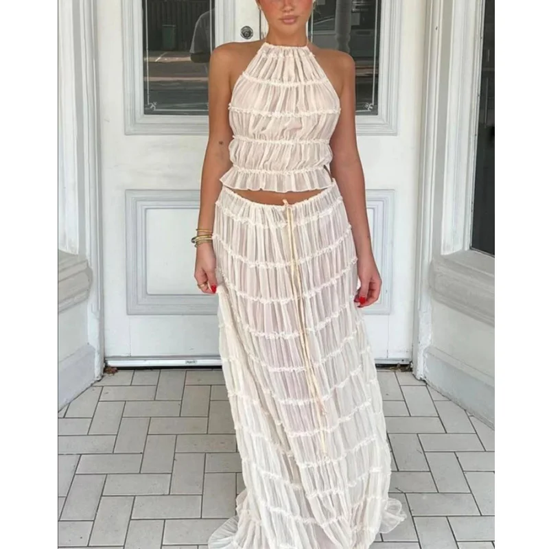 Elegant Halter Pleated Suit Women 2 Piece Set Summer Lace Up Backless Short Solid Fold Top Sets Female Loose Long Skirts Set
Elegant Halter Pleated Suit Women 2 Piece Set Summer Lace Up Backless Short Solid Fold Top Sets Female Loose Long Skirts Set