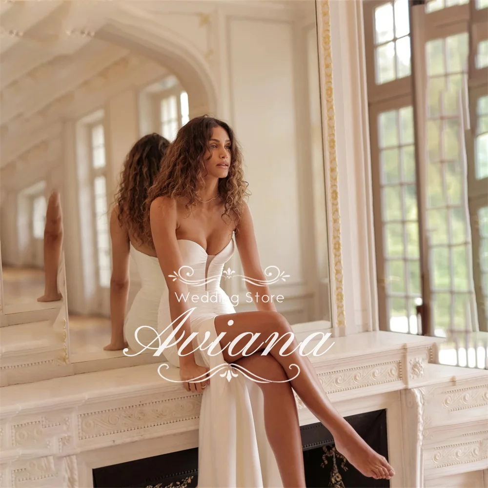 Aviana Customized Strapless Bridal Gown Deep V-Neck Ruched Bodice High Side Split Satin Fabric Sweep Train New Design Elegant
Aviana Customized Strapless Bridal Gown Deep V-Neck Ruched Bodice High Side Split Satin Fabric Sweep Train New Design Elegant