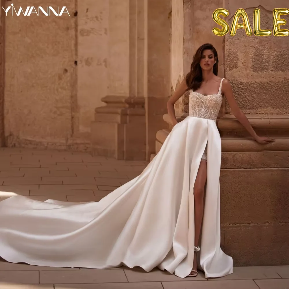Hand-sewn Sequined Pearls Wedding Dress Sexy Side High Slit Bride Robe Vintage Satin Long Bridal Gown Customized Robe De Mariée
Hand-sewn Sequined Pearls Wedding Dress Sexy Side High Slit Bride Robe Vintage Satin Long Bridal Gown Customized Robe De Mariée