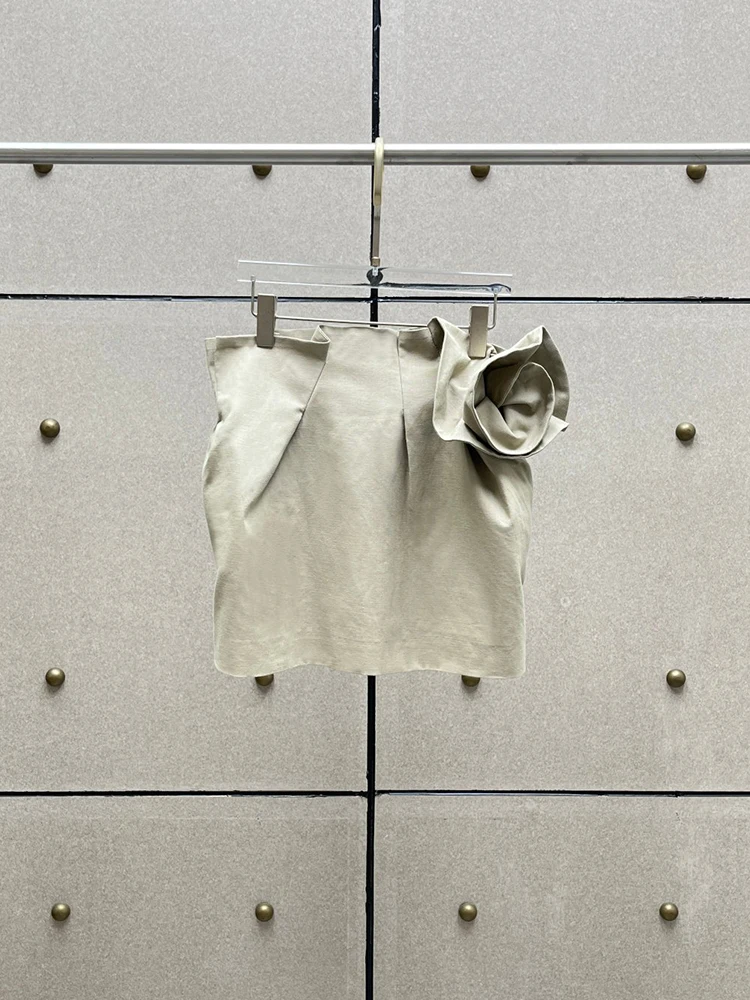 Women's skirt featuring 3D floral embellishments, a tulip-style silhouette, and a stylish, pleated ruffle waist.
Women's skirt featuring 3D floral embellishments, a tulip-style silhouette, and a stylish, pleated ruffle waist.