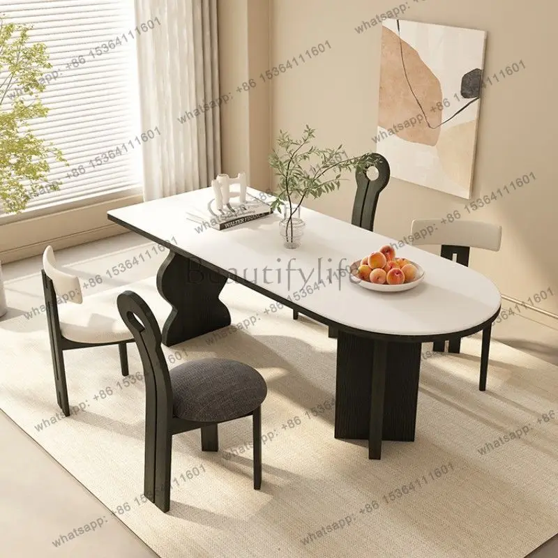 Nordic solid wood travertine rock slab dining table household French dining table oval medium ancient style
Nordic solid wood travertine rock slab dining table household French dining table oval medium ancient style