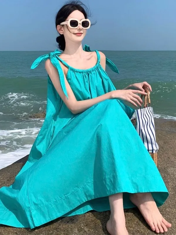 Beach vacation dress with women's lace up design and a sense of camisole dress. Summer loose casual beach dress is trendy 968C
Beach vacation dress with women's lace up design and a sense of camisole dress. Summer loose casual beach dress is trendy 968C