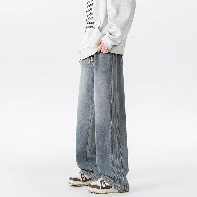 Men's drawstring spliced jeans, American style fashionable straight leg casual pants, loose oversized fashionable new jeans
Men's drawstring spliced jeans, American style fashionable straight leg casual pants, loose oversized fashionable new jeans