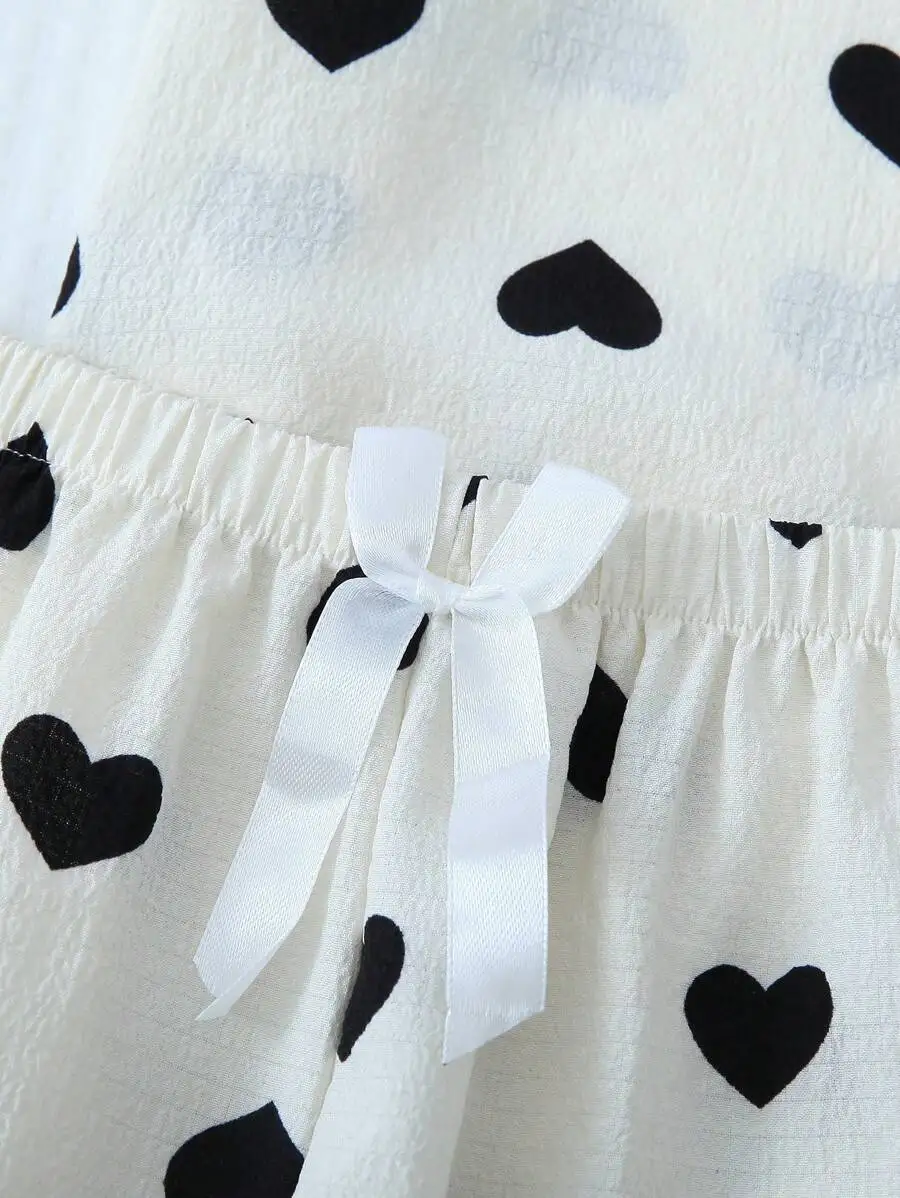 Womens Summer Pajama Set With Black Heart Print Bowknot Shorts Short Sleeve Top Home Wear
Womens Summer Pajama Set With Black Heart Print Bowknot Shorts Short Sleeve Top Home Wear
