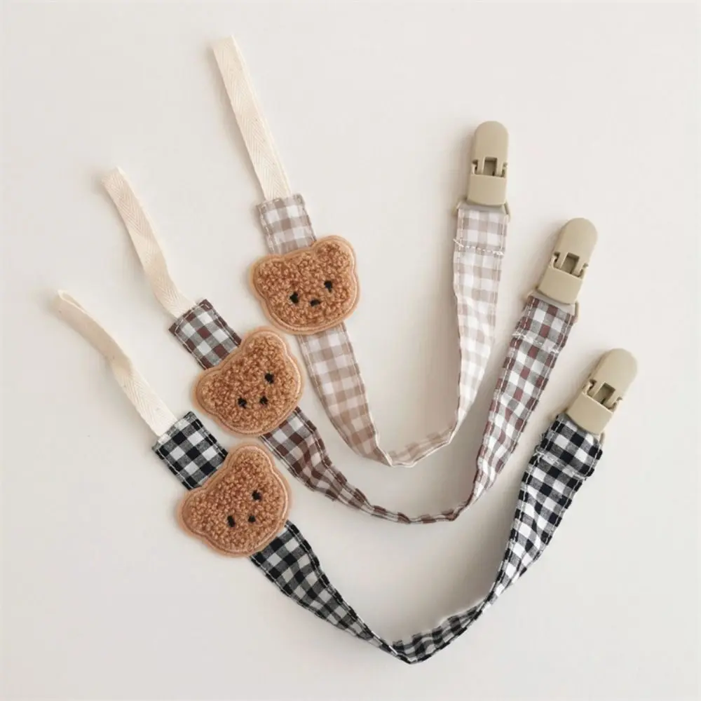 Cute Embroidery Baby Cloth Pacifier Chain Lattice Bear Soother Holder Dummy Clips Adjustable Nipple Holder Clips Toddler
Cute Embroidery Baby Cloth Pacifier Chain Lattice Bear Soother Holder Dummy Clips Adjustable Nipple Holder Clips Toddler