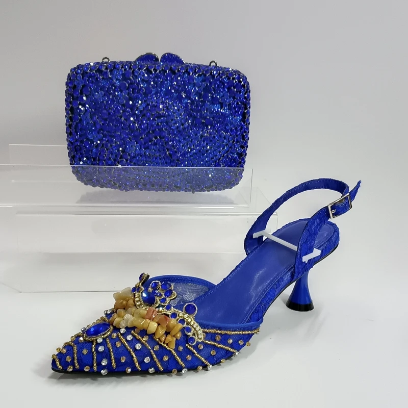 INSIGHTLINK Elegant Women stiletto Heels Shoes and Bag Set Hollow Rhinestones High Heels Sandals Blue Gems Shoes Matching Bag
INSIGHTLINK Elegant Women stiletto Heels Shoes and Bag Set Hollow Rhinestones High Heels Sandals Blue Gems Shoes Matching Bag