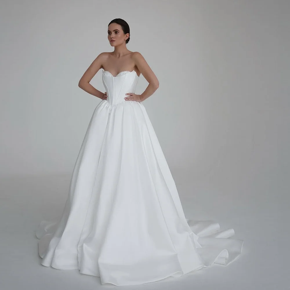 Modest Off-Shoulder Satin Beaded Pearls Wedding Bridal Dress Backless Zipper A-line Wedding Gown with Trian Customized
Modest Off-Shoulder Satin Beaded Pearls Wedding Bridal Dress Backless Zipper A-line Wedding Gown with Trian Customized