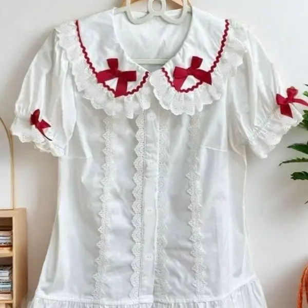 Lolita with new Lolita Japanese sweet summer short-sleeved top doll collar shirt cute bubble sleeves kawaii clothes
Lolita with new Lolita Japanese sweet summer short-sleeved top doll collar shirt cute bubble sleeves kawaii clothes