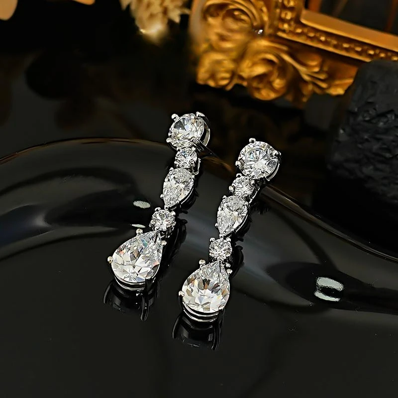 925 silver large earrings with European and American water droplet inlay, high carbon diamond earrings, simple design
925 silver large earrings with European and American water droplet inlay, high carbon diamond earrings, simple design