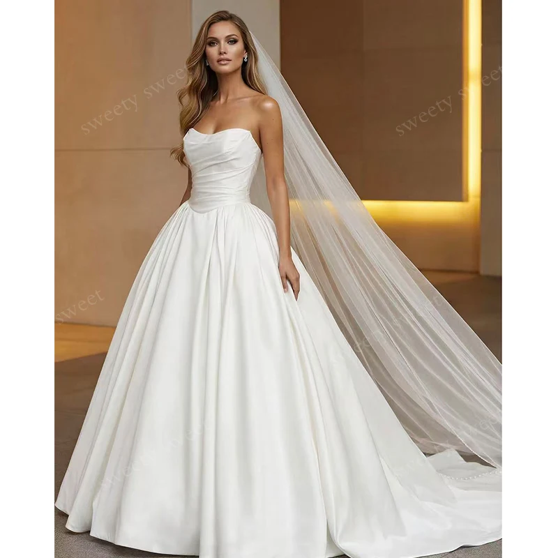 Graceful Wedding Dress Fully Satin A-Line Ball Gown Sleeveless Strapless Customized Bride Dress Back Button Robe MariéE Satin
Graceful Wedding Dress Fully Satin A-Line Ball Gown Sleeveless Strapless Customized Bride Dress Back Button Robe MariéE Satin