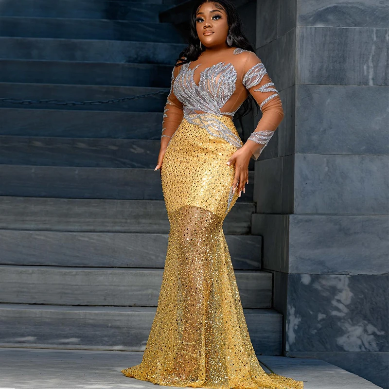 Золотистые вечерние платья-русалки Aso Ebi, блестящие платья для торжественных случаев, прозрачный вырез, длинные рукава, со шлейфом и блестками, аппликации с жемчугом
Золотистые вечерние платья-русалки Aso Ebi, блестящие платья для торжественных случаев, прозрачный вырез, длинные рукава, со шлейфом и блестками, аппликации с жемчугом