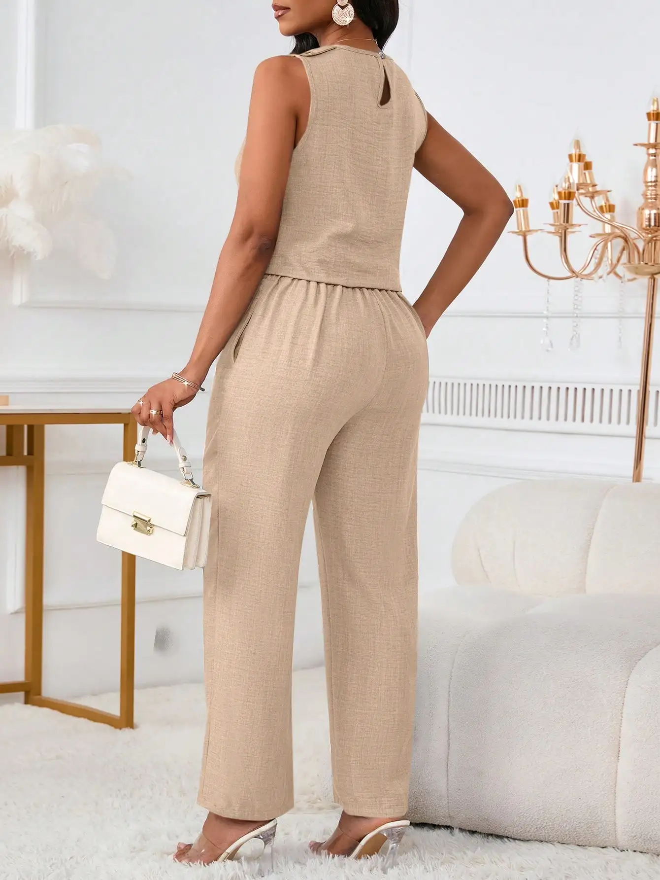 2-Piece Women Sleeveless Vest And Wide Leg Pants Set With Slanted Pockets Button Detail Elegant Summer
2-Piece Women Sleeveless Vest And Wide Leg Pants Set With Slanted Pockets Button Detail Elegant Summer