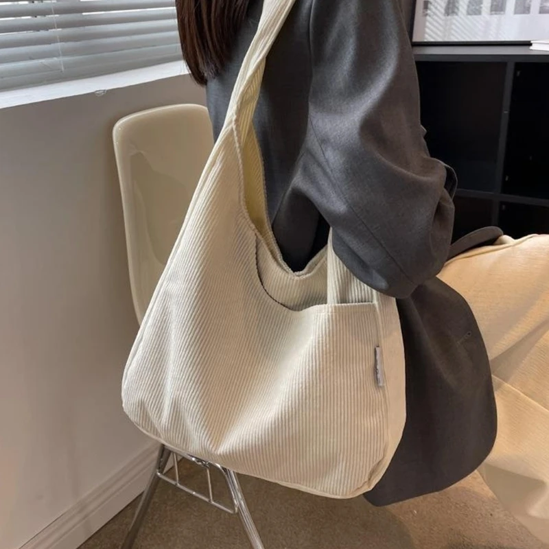 Women's Organized Ribbed Handbag Generous Storage Space Practical Compartments Ergonomic Shoulder Belt
Women's Organized Ribbed Handbag Generous Storage Space Practical Compartments Ergonomic Shoulder Belt