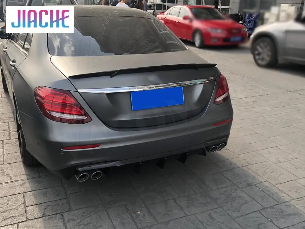 Rear Diffuser with Exhaust Front Lip Bumper Side Skirts Rear Wing Support Brackets for Benz W213 E63 AMG 2017+Rear Spoiler
Rear Diffuser with Exhaust Front Lip Bumper Side Skirts Rear Wing Support Brackets for Benz W213 E63 AMG 2017+Rear Spoiler