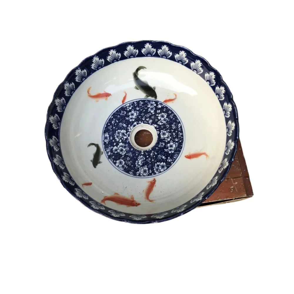 Blue and white fish patterned ceramic art basin, European handmade Chinese style washbasin
Blue and white fish patterned ceramic art basin, European handmade Chinese style washbasin