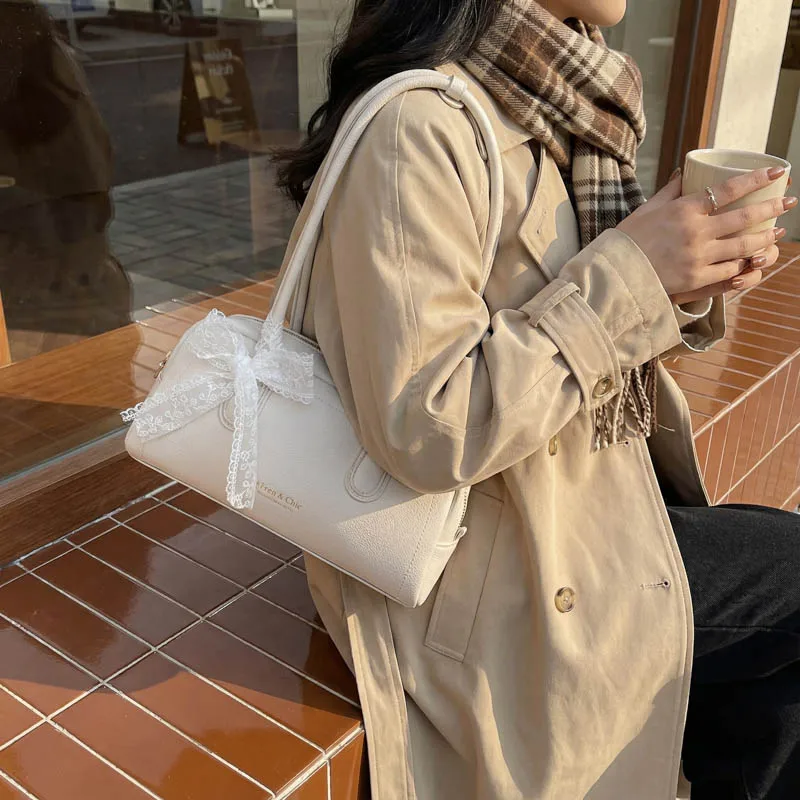 Fashionable Ladies Baguette Shoulder Bag with Bowtie Underarm Commuter Bag for Women Stylish Single Strap Handbag
Fashionable Ladies Baguette Shoulder Bag with Bowtie Underarm Commuter Bag for Women Stylish Single Strap Handbag