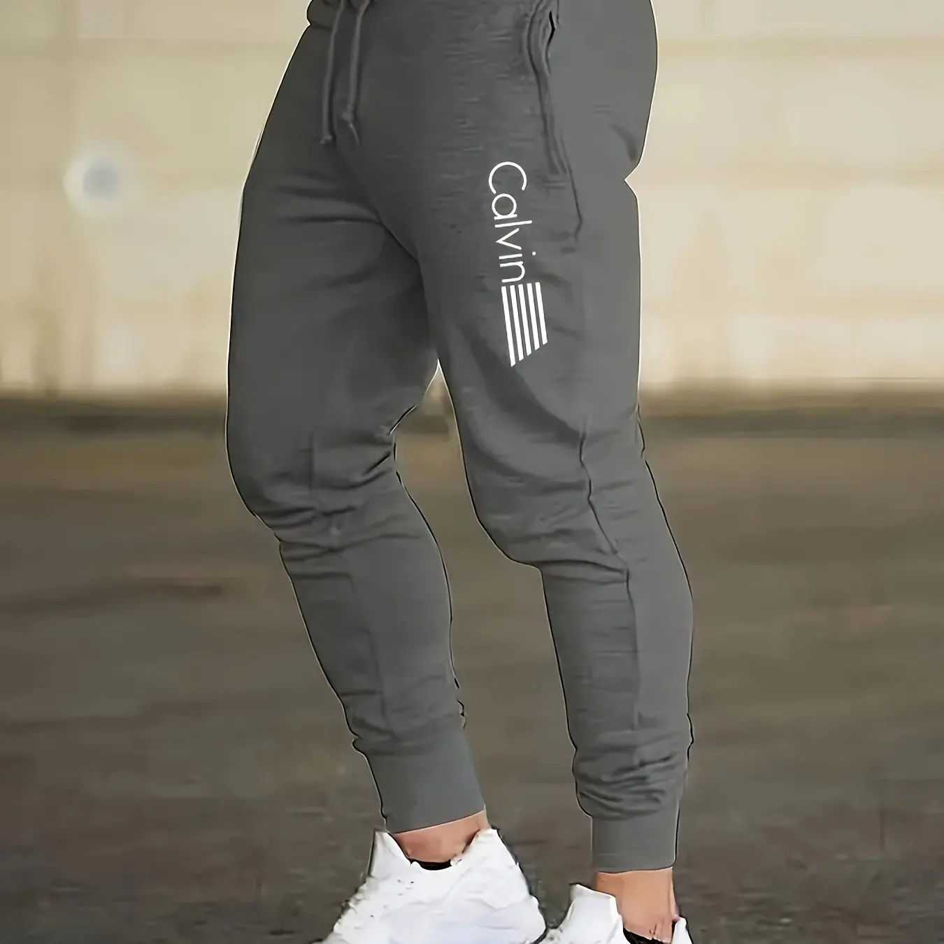 Men's Casual Sports Pants with Drawstring, Letter Print, Loose Fit for Outdoor, Sports & Casual Wear in Spring and Summer
Men's Casual Sports Pants with Drawstring, Letter Print, Loose Fit for Outdoor, Sports & Casual Wear in Spring and Summer