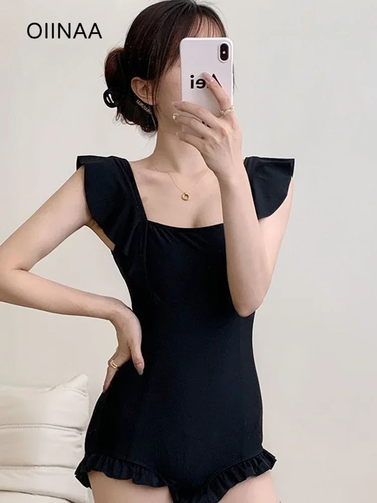 OIINAA Black Swimsuit Women Ruffled One-Piece Bodysuit Summer 2025 New Hot Spring Swimwear Fashion Holiday Beach Bathing Suit
OIINAA Black Swimsuit Women Ruffled One-Piece Bodysuit Summer 2025 New Hot Spring Swimwear Fashion Holiday Beach Bathing Suit